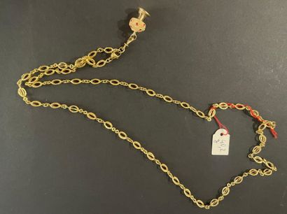 Gold necklace and pendant with mushroom design.
Weight:...