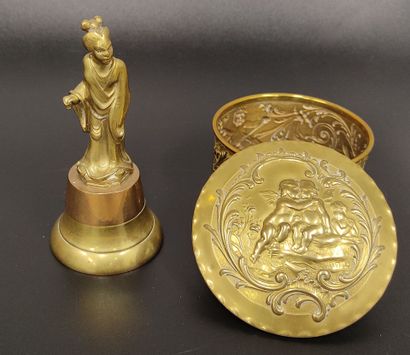 A brass lot: 
A round box decorated with...