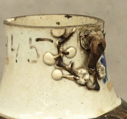 A set of two Nanking ceramic vases with Asian...