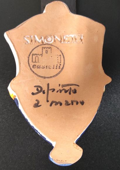 An earthenware stoup decorated with the Carmelite...