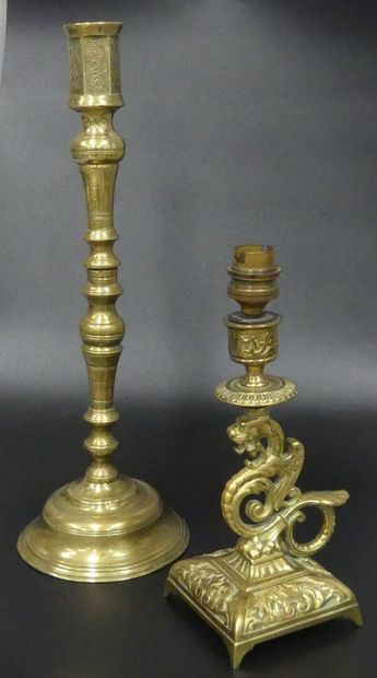 A bronze poucier candlestick with chimera...