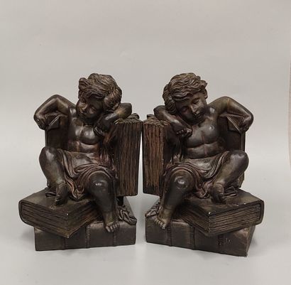 A pair of composite bookends
with sleeping...