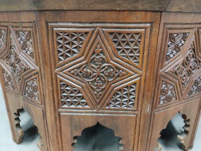 A richly carved Syrian dodecagon coffee table
H...