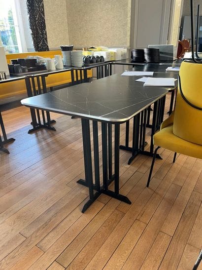 LOT of eleven small tables, black metal legs,...