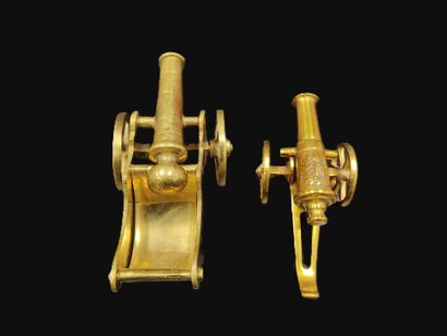 Two brass barrels, one decorated with Napoleon's...