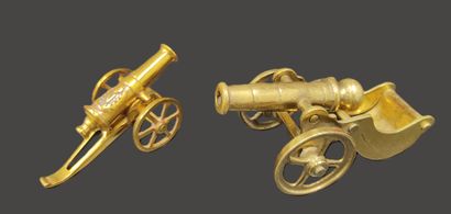 Two brass barrels, one decorated with Napoleon's...