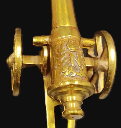 Two brass barrels, one decorated with Napoleon's...