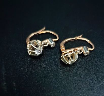 Pair of yellow gold (eagle) sleeper earrings,...