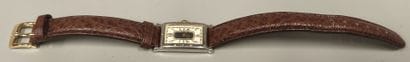 SEIKO 
Rectangular watch, brown leather strap
Quartz...
