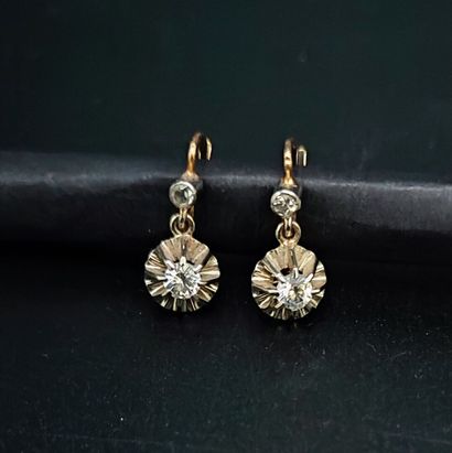 Pair of yellow gold (eagle) sleeper earrings,...