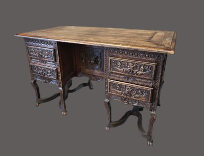 A mazarin desk in natural wood in the Henri...