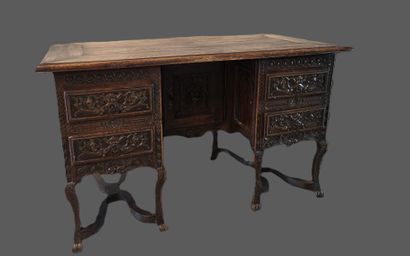 A mazarin desk in natural wood in the Henri...