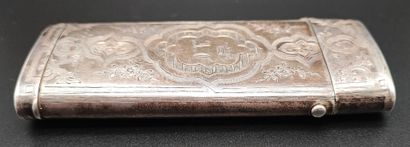Flat silver case engraved with scrolls and...