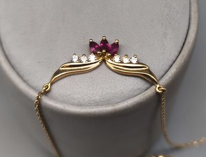 Gold choker necklace set with small rubies...
