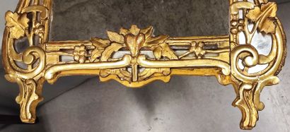 Louis XVI period carved and gilded wood mirror...