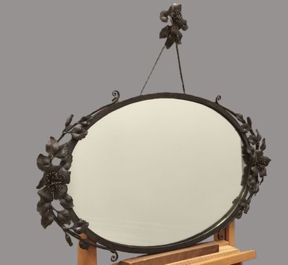 Oval hammered wrought-iron mirror with rosehip...