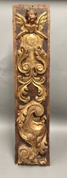 Gilded wood panel carved with a cherub, 17th...