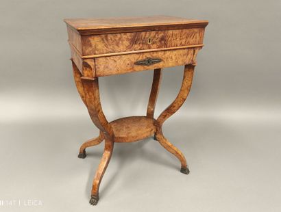 Small burr veneered book table from the Charles...