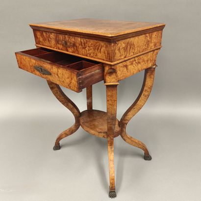 Small burr veneered book table from the Charles...