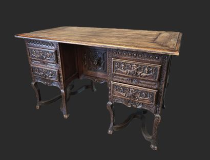A mazarin desk in natural wood in the Henri...