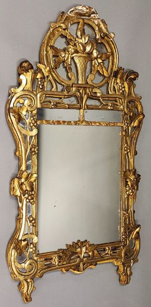 Louis XVI period carved and gilded wood mirror...