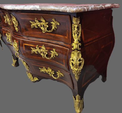 Louis XV chest of drawers 
It opens with...