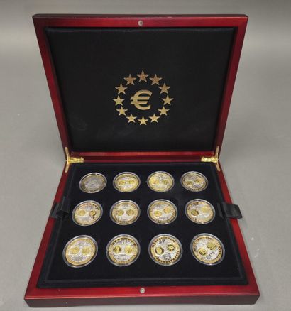 Set of 20 silver and gold-plated coins 
The...