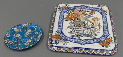 Set including a Gien earthenware trivet with...