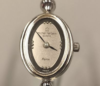 MICHEL HERBELIN
Watch in silver-plated metal...