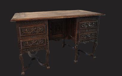 A mazarin desk in natural wood in the Henri...