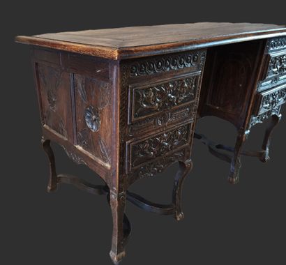A mazarin desk in natural wood in the Henri...
