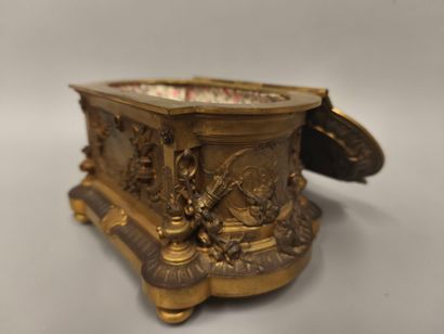 Gilt bronze and patinated jewelry box decorated...