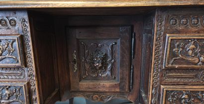 A mazarin desk in natural wood in the Henri...