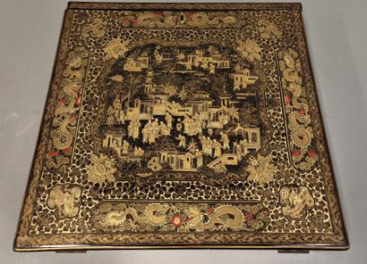 CHINA, 20th century
Black and gold lacquer...