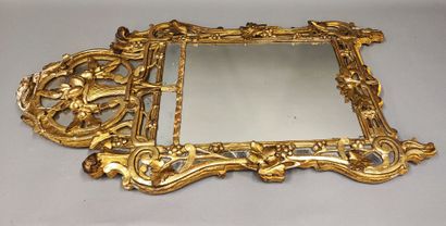 Louis XVI period carved and gilded wood mirror...