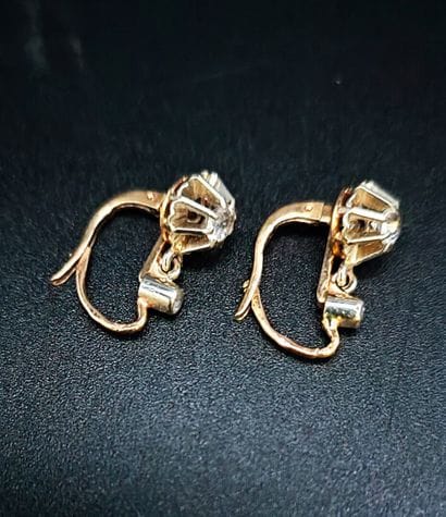Pair of yellow gold (eagle) sleeper earrings,...