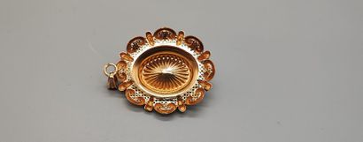 Gold pendant with oval medallion set with...