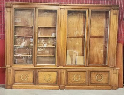 Mahogany veneered two-part bookcase opening...