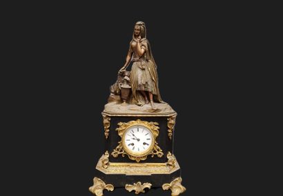 Black marble clock surmounted by an oriental-style...