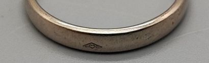 Wedding band in white gold (750). Eagle head...