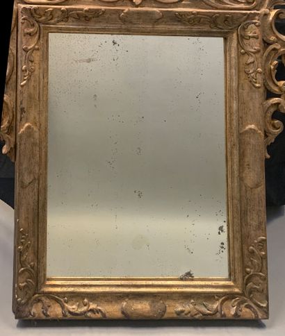Venetian-style carved wood and silver mirror...