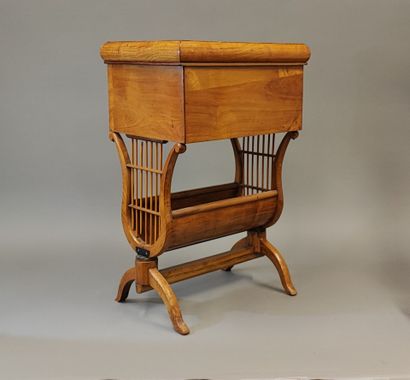 Light wood bowl table, lyre base. Charles...