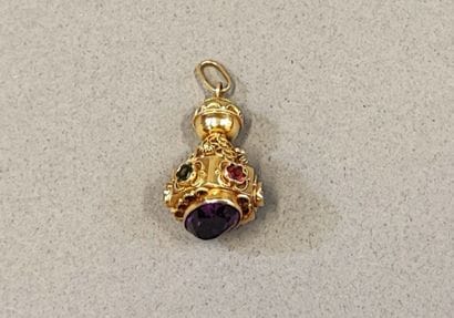 18K (750) gold pendant set with a large amethyst...