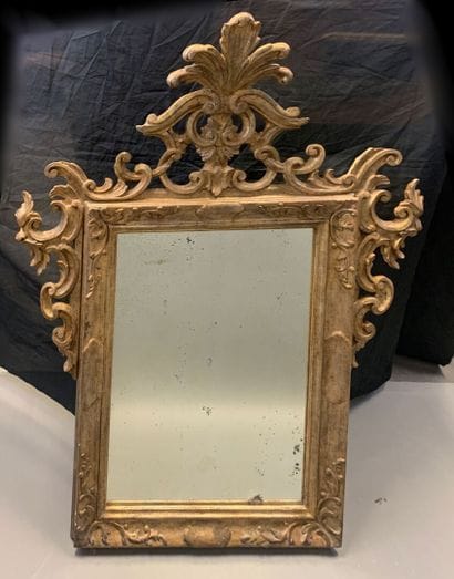 Venetian-style carved wood and silver mirror...