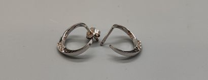 Pair of crescent-shaped earrings in white...