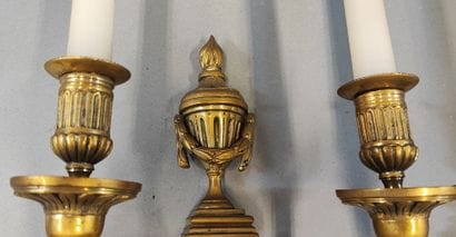 Pair of ormolu sconces with two arms of light...
