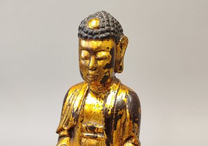 VIETNAM, circa 1900. Buddha seated on a lotus...