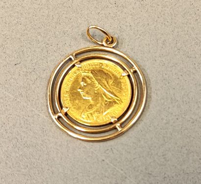 18K (750) gold pendant set with an 1888 sovereign....