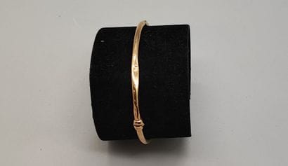 Yellow gold (750) openwork bangle with safety...