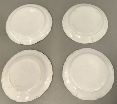 FAIENCE DE L'EST. Four earthenware plates...